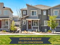 Charming home exterior with well-maintained landscaping and inviting entrance at 23527 E 5Th Pl, Aurora, CO 80018