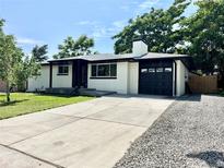 Charming single-story home with a well-maintained lawn and concrete driveway at 8873 Princeton St, Westminster, CO 80031