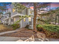 Charming two-story townhome with a well-maintained front yard and inviting entrance at 42 S Moline St, Aurora, CO 80012