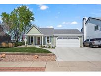 Charming single-Gathering home with a well-manicured lawn and an attached two-car garage in a great neighborhood at 803 W Lucerne Dr, Lafayette, CO 80026
