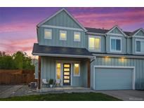 Charming two-story home with a welcoming porch and attached garage at 919 Russell St, Golden, CO 80401