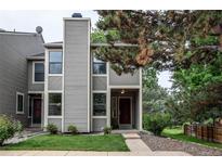 Charming townhome with a well-manicured lawn and inviting front entrance at 4621 S Fraser Cir # A, Aurora, CO 80015