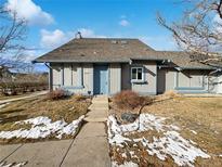 Inviting exterior of a charming home with a well-maintained lawn at 2500 S Victor St # A, Aurora, CO 80014