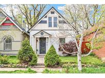 Charming home featuring a well-manicured lawn and beautiful curb appeal at 3289 Perry St, Denver, CO 80212