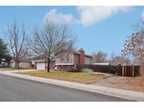 Ranch style home with attached garage and fenced backyard at 327 S 29Th Ave, Brighton, CO 80601