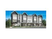 Modern townhome featuring dark gray siding, a covered porch, and an elevated front entry at 700 Saddle Dr, Erie, CO 80516