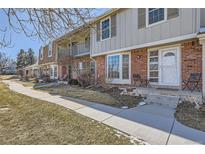 Charming multi-story townhomes featuring brick accents, front patios, and well-maintained landscaping at 2777 E Geddes Ave, Centennial, CO 80122