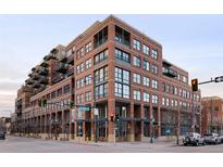 Beautiful brick building in the city with balconies and large windows offers urban living at its finest at 1499 Blake St # 6A, Denver, CO 80202