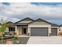 Charming single Gathering home with a three car garage and beautiful landscaping at 4465 Mesa Top Dr, Monument, CO 80132