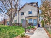 Well-maintained exterior featuring a modern design, landscaping, and a charming entrance at 1303 Jersey St, Denver, CO 80220