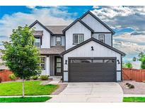 Charming two-story home with a well-manicured lawn and a modern two-car garage at 638 W 175Th Ave, Broomfield, CO 80023