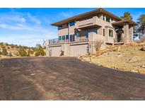 Two-story home with attached two-car garage and mountain views at 457 Buena Vista Rd, Golden, CO 80401