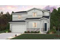 Charming two-story home featuring a two-car garage, stone accents, and a beautifully landscaped front yard at 4265 Gozzer Ranch Dr, Elizabeth, CO 80107