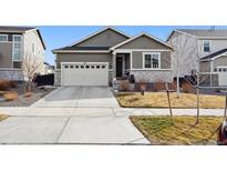Charming single-Gathering home with a two-car garage and well-maintained front lawn at 226 S Shady Grove Ct, Aurora, CO 80018