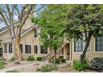Charming multi-level condo with private entrance and natural landscaping at 4876 E Kentucky Ave # F, Denver, CO 80246