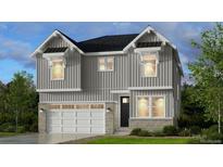 Charming home featuring gray siding, stone accents, an attached garage, and well-maintained landscaping at 13358 Blue Amber Ct, Parker, CO 80134