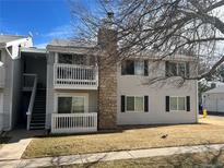 Two-story condo building with balconies and landscaping at 14453 E Jewell Ave # 104, Aurora, CO 80012