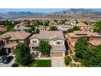 Two-story house with mountain views and landscaped yard at 2263 S Loveland St, Denver, CO 80228