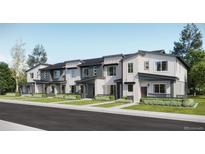 Modern townhomes with landscaping and neutral color schemes offers charming curb appeal in a well-maintained community at 16741 E Irwin Ave, Centennial, CO 80016