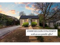 Charming single-story home with a well-maintained yard and inviting entryway at 661 Tennyson St, Denver, CO 80204
