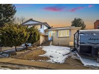 Ranch style home with landscaping, RV parking, and a spacious front yard at 5510 W 103Rd Ave, Westminster, CO 80020