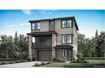 A modern, three-story home features stone accents, a balcony, and a two-car garage at 3179 S Russell St, Morrison, CO 80465