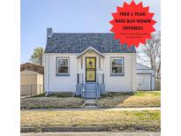 Charming one-story home with an attached garage and well-kept landscaping at 4354 Chase St, Denver, CO 80212