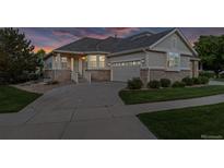 Beautiful single-Gathering home with well-maintained landscaping and an attached two-car garage at 8258 S Sicily Ct, Aurora, CO 80016