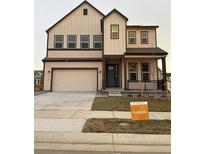 Charming two-story home with a two-car garage and manicured front lawn at 5626 W 142Nd Ave, Broomfield, CO 80020