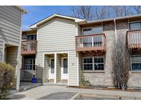 Charming townhome with private balconies, brick accents and a welcoming entrance at 1865 Terry St # 3, Longmont, CO 80501