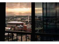 Stunning city view overlooking the skyline and mountains from a modern high-rise window at 1133 14Th St # 2110, Denver, CO 80202