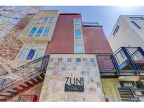 Stylish, multi-story building with modern architecture and a unique Zuni 3040 address plaque at 3040 Zuni St # F, Denver, CO 80211