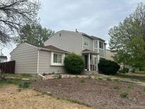 Charming two-story home with well-maintained landscaping at 4320 Nepal St, Denver, CO 80249