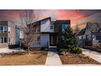 Contemporary home featuring a modern design, landscaped front yard, and a welcoming entrance at 1270 Olive St, Denver, CO 80220