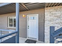 Welcome home to this inviting front door with modern accents and clean finishes at 120 S Pennsylvania St # 207, Denver, CO 80209