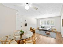 Cozy living room with hardwood floors, ample natural light, and stylish decor at 2047 S Milwaukee St # 4, Denver, CO 80210