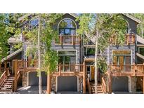Charming exterior with balconies, a stone foundation and lots of light at 434 Kings Crown Rd, Breckenridge, CO 80424