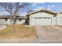 Charming single-story home with a well-maintained lawn, a two-car garage, and beautiful curb appeal at 12062 E Maple Ave, Aurora, CO 80012