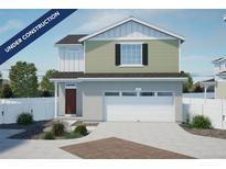 Two-story home with a white garage door and siding, with sage green horizontal siding on the second story at 22073 E 38Th Pl, Aurora, CO 80019