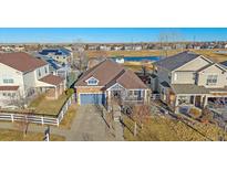 Charming single-Gathering home with well-manicured lawn near a pond and neighborhood at 1392 S Duquesne Cir, Aurora, CO 80018