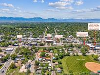 Beautiful aerial view of home's location, close to neighborhood amenities, schools and stunning mountain views at 1101 Spruce St, Louisville, CO 80027