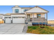 Two-story house with white siding, gray accents, and a two-car garage at 3493 N Irvington St, Aurora, CO 80019