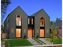 Stunning modern home with striking architectural details and manicured front yard at 2378 S Bannock St, Denver, CO 80223