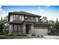 Charming two-story home showcasing stone accents, a covered porch, and an attached two car garage at 12750 W Glasgow Pl, Littleton, CO 80127