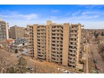 Multi-story building with balconies on each level offers stunning city views, ideal for urban living at 700 N Washington St, Denver, CO 80203