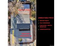 Spacious 6000 sqft lot with RV parking and a private fenced-in backyard at 1705 S Yuma St, Denver, CO 80223