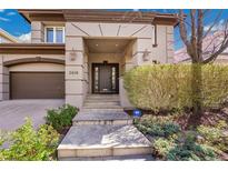 Inviting home entrance with stone steps and meticulously maintained landscaping adds curb appeal at 2616 E Cherry Creek South Dr, Denver, CO 80209
