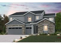 Charming two-story home featuring a blend of stone and siding, complemented by a well-manicured lawn at 2465 Lupton Ln, Lafayette, CO 80026