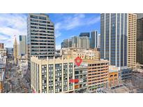 Downtown Denver aerial view showcasing the building's location and surrounding cityscape at 1617 California St # 3B, Denver, CO 80202