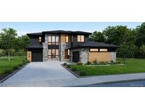 Stunning two-story home with stone and wood accents, showcasing a modern design at 1210 W 144Th Ct, Westminster, CO 80023